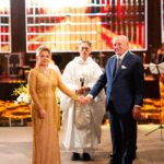 Romelita e Rogério Tokarski, Padre Américo
